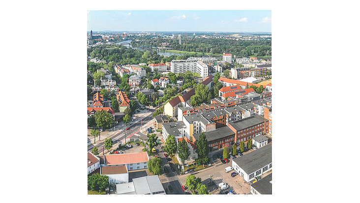 Buchcover mit Luftaufnahme von Buckau